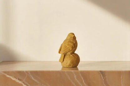 Sitting on Stone Bird Candle 5x3 inches