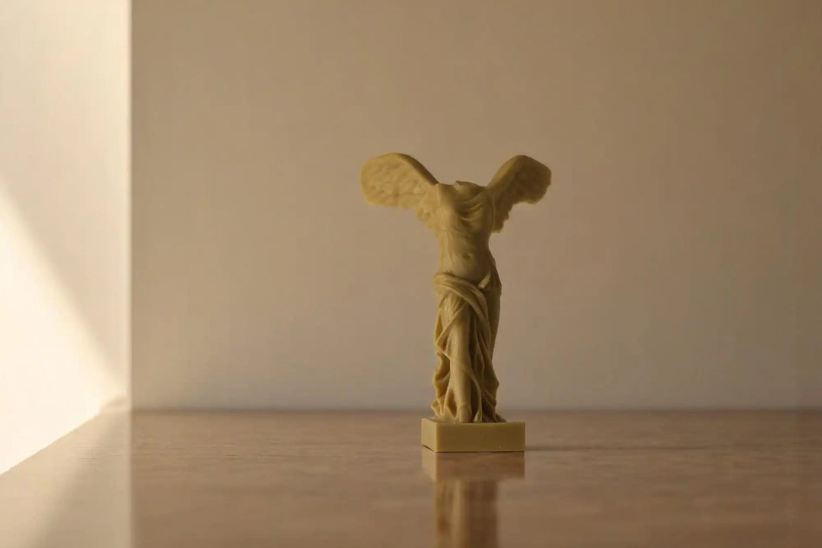 Winged Victory Candle 7x2 inches